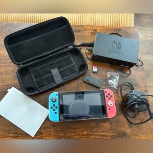 Nintendo Switch With Blue & Red Joy Con, Dock, Charger, Carrying Case + More